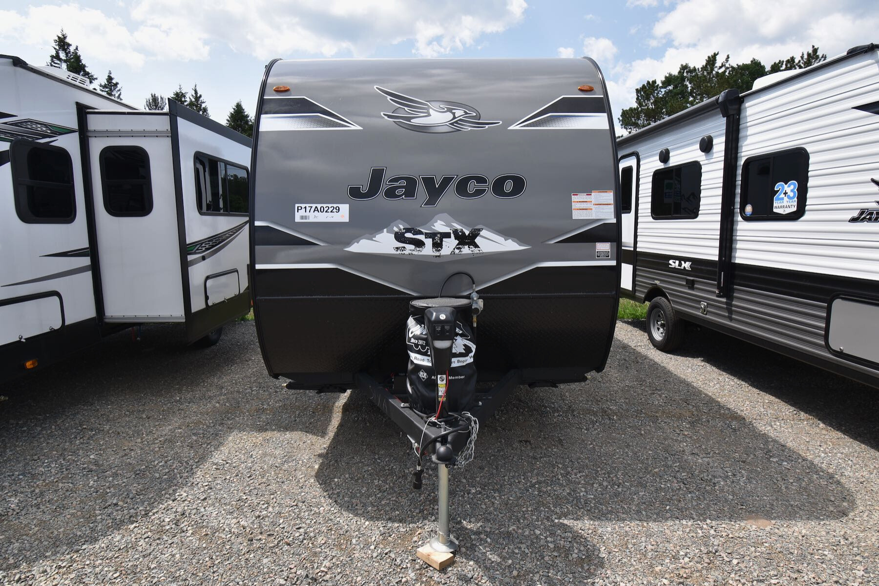 The Jayco Jay Flight SLX 195RB travel trailer parked on an RV dealership lot