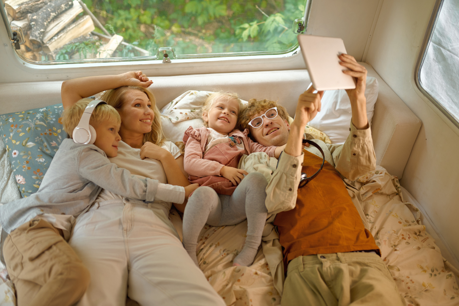 Family lounging around in an RV 
