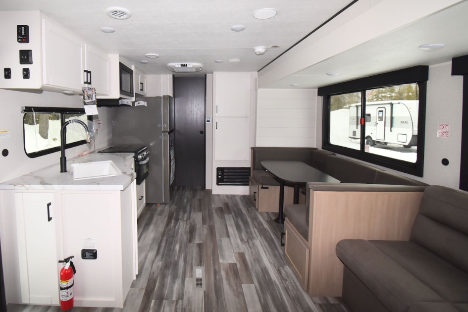 The kitchen and living space of a Jayco Jay Flight travel trailer