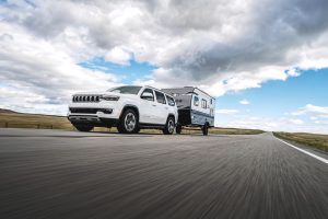 SUV towing a Jayco Travel Trailer